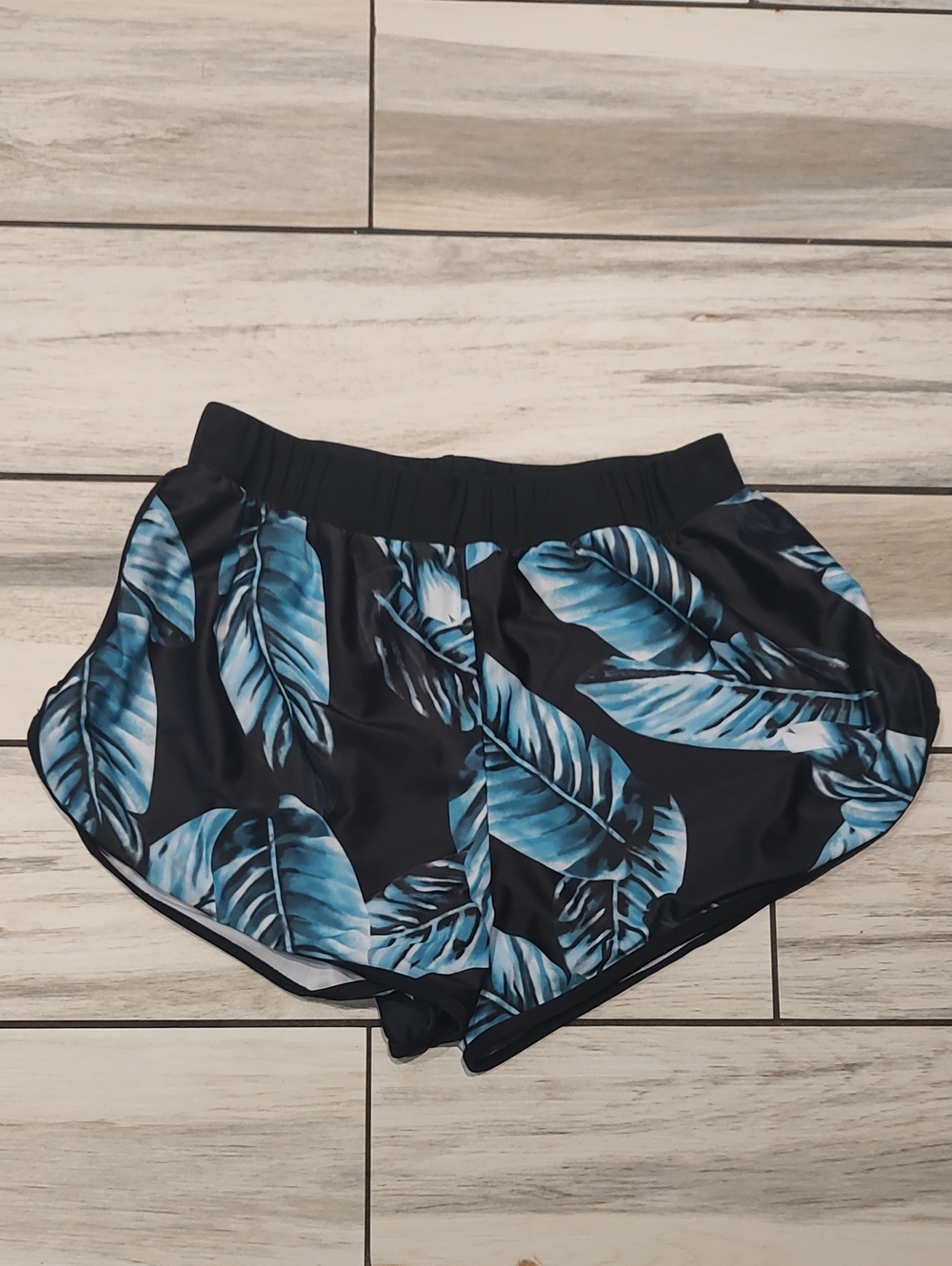 Black Swim Shorts with Blue Leaf Print